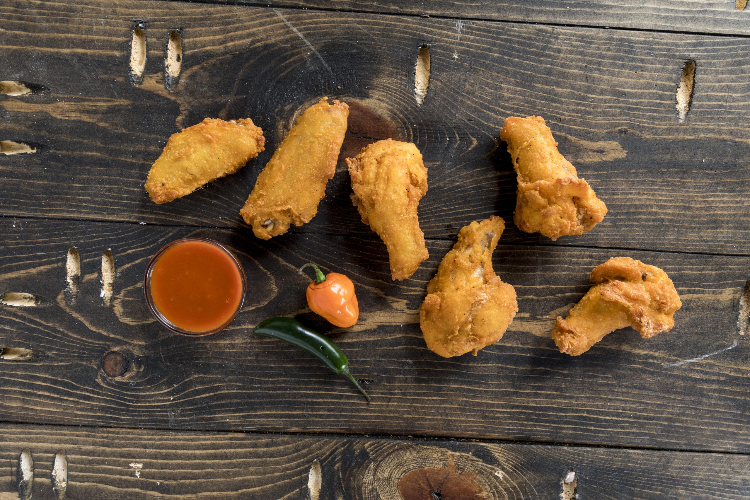 Chicken Wings with dipping sauce.